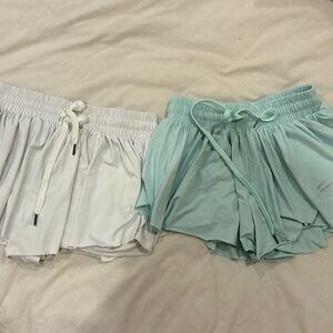 white and teal butterfly shorts